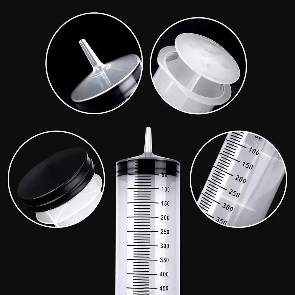 Multifunctional syringe for pets showing various caps and measurement markings, ideal for liquids and easy to clean.