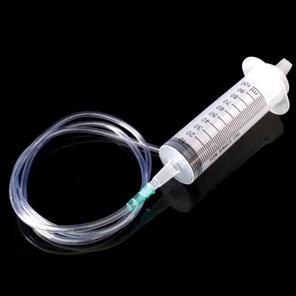 Multifunctional syringe for pet care, 100ml-550ml capacity with 100cm hose, perfect for feeding liquids.